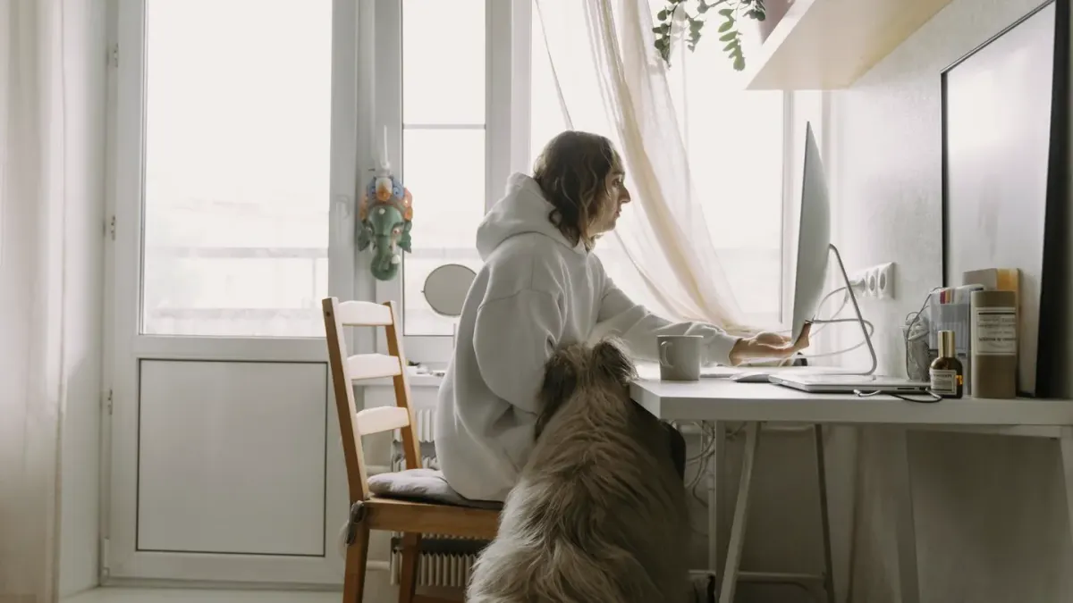Dog in kitchen with owner