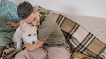 Dog owner at home