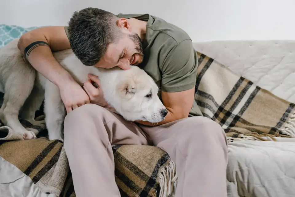 Dog owner at home