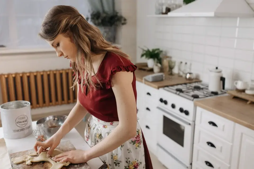 Dog owner preparing a meal